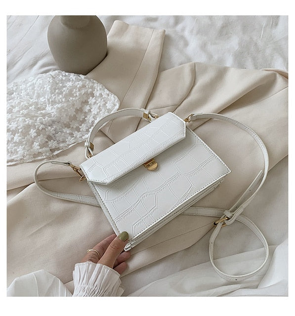 SWDF Stone Handbags