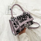 Graffiti painted leather crossbody bag